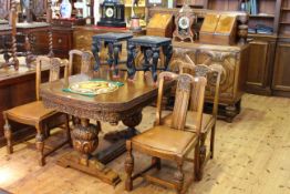 Carved Lees oak six piece dining suite comprising three door sideboard with raised back,
