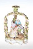 Continental porcelain group of couple under flower encrusted arbor