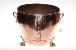 Highly polished copper and brass two handled jardiniere on paw feet