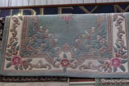 Indian Aubusson rug with a green ground 2.40 by 1.