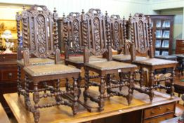 Set of six carved oak and cane seated chairs