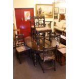 Ercol Old Colonial oval extending dining table and eight dining chairs including pair carvers