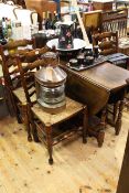 Oak gate leg dining table on turned legs and set of four rush seated ladder back dining chairs
