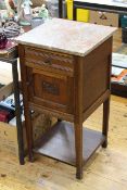 Pair Continental oak and marble topped pot cupboard,