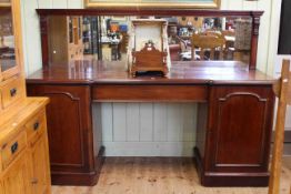 Victorian mahogany mirror backed chiffonier having central drawer flanked by a pair of pedestal