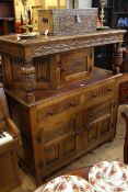 Marcus Ltd carved oak court cupboard,