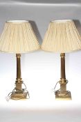 Pair satin brass column table lamps