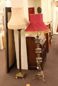 Brass corinthian column standard lamp and ornate metal standard lamp,