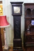 Carved oak triple weight longcase clock having square brass dial inscribed R.