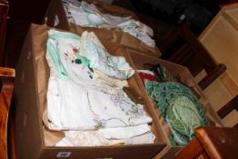 Three boxes of table linen,