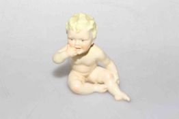 Royal Worcester figure of a seated child,