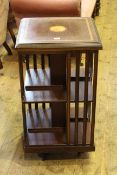 Mahogany and satinwood inlaid two tier revolving bookcase,
