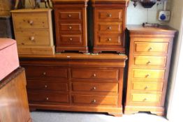 French Exigence four piece bedroom suite comprising eight drawer low chest,
