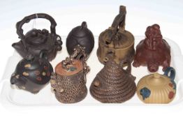 Collection of eight Oriental stoneware teapots