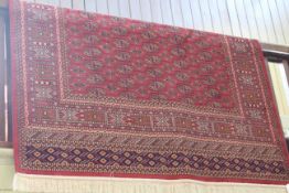 Bokhara carpet with a red ground
