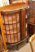 1920's shaped front mahogany two door china cabinet on ball and claw legs