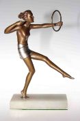 Art Deco bronze hoop girl,