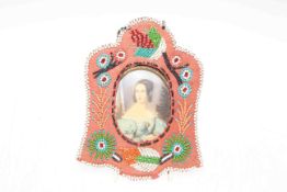 Oval portrait miniature in bead work holder