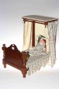 Heubach Kopplesdorf bisque head doll together with half tester bed