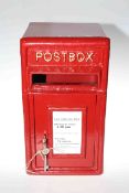Small red cast postbox