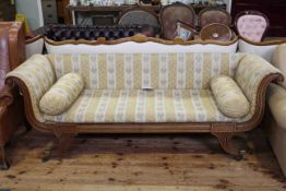 Regency mahogany double scroll settee in striped tapestry fabric,