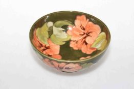 Moorcroft Pottery bowl with hibiscus design on green ground