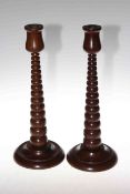 Pair of turned wood candlesticks