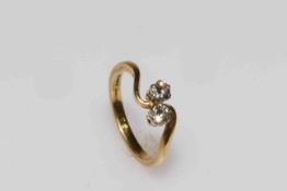 18 carat gold two stone diamond twist design ring