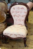Mahogany framed spoon back nursing chair in buttoned fabric