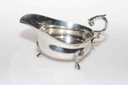 Silver sauce boat with scroll handle, London 1933,