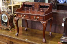 Miniature mahogany Chippendale style writing desk,