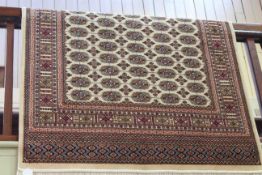 Bokhara rug with a beige ground 1.90 by 1.