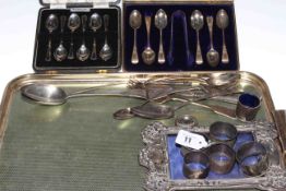 Two cased silver teaspoons, silver photograph frame,