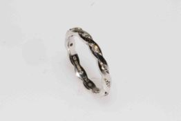 18 carat gold and diamond twist eternity ring,