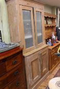 Victorian pine cabinet bookcase having two glazed panel doors above two cupboard doors