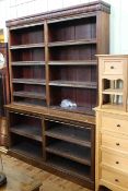 Late 19th/early 20th century four division open bookcase with eleven adjustable shelves,