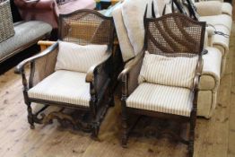 Two similar Carolean style cane panelled armchairs