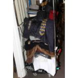 Large collection of designer and other clothing and hats