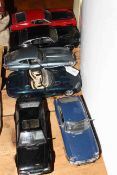 Six scale model cars, including E-type,