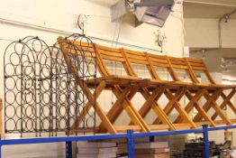 Set of six hardwood folding patio chairs and three metal wine racks (9)