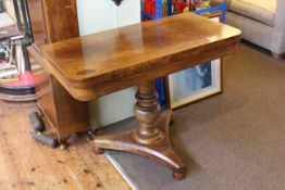19th Century rosewood fold top tea table on turned pedestal to triform base