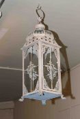 Pair of ornate metal and glazed hall lanterns