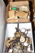 Two boxes of watches and parts