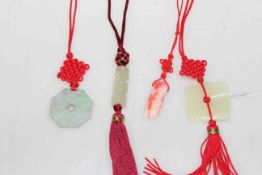 Four fabric and jade necklaces,
