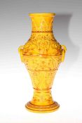 Yellow glazed moulded pottery vase