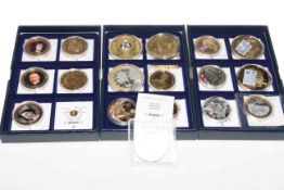 Three boxes of commemorative coins