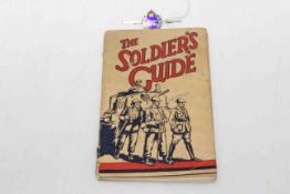 Silver and enamel RAC brooch and a soldier's guide