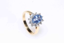 18 carat yellow gold, unheated sapphire and diamond cluster ring,