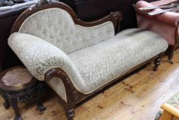 Victorian arched back chaise longue on turned legs