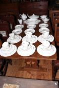 Oriental dinner and tea service decorated with landscape scenes